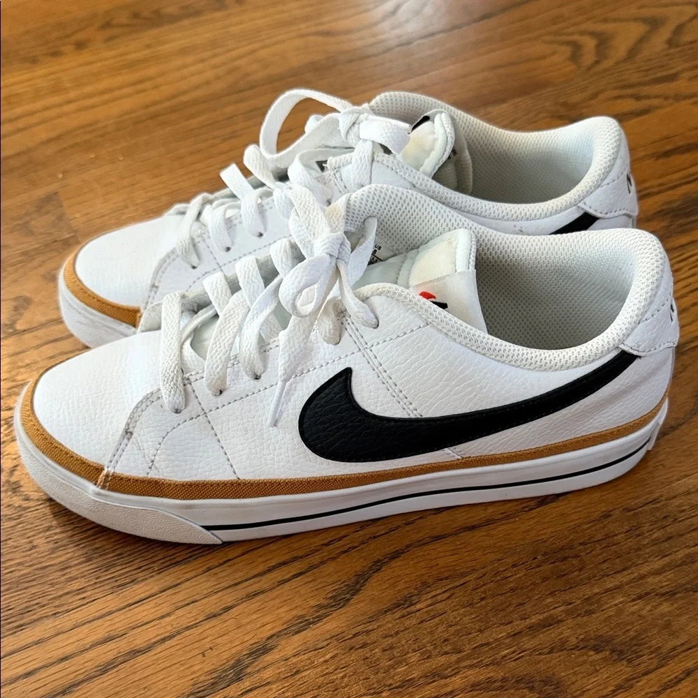 Nike Court Legacy White Low-Top Sneakers with Black Swoosh and Gold Accent